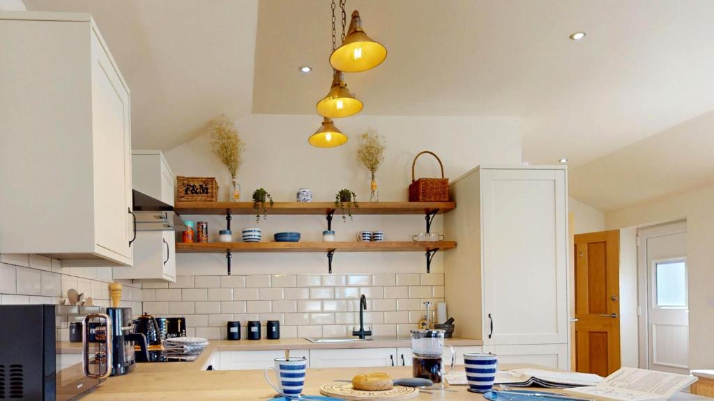 Η κουζίνα ή μικρή κουζίνα στο Trillo Lodge