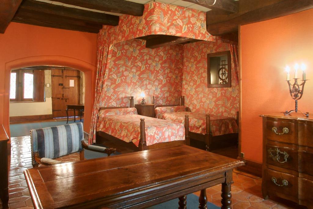 Posezení v ubytování Hostellerie du Vieux Pérouges