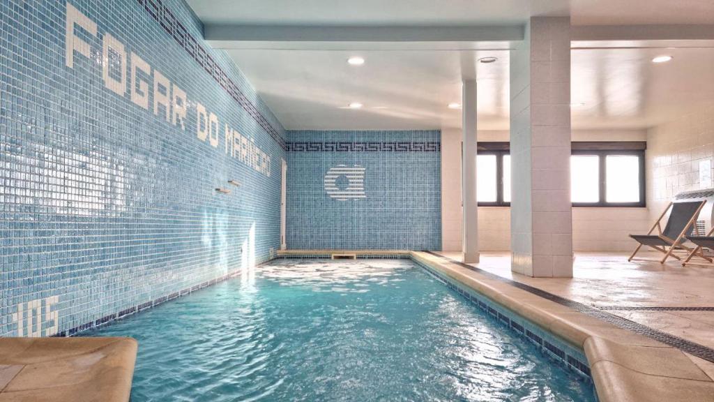 Bazén v ubytovaní Hotel Alda Fogar do Mariñeiro alebo v jeho blízkosti