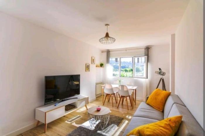 TV a/nebo společenská místnost v ubytování Apartamento reformado cerca de Cabarceno