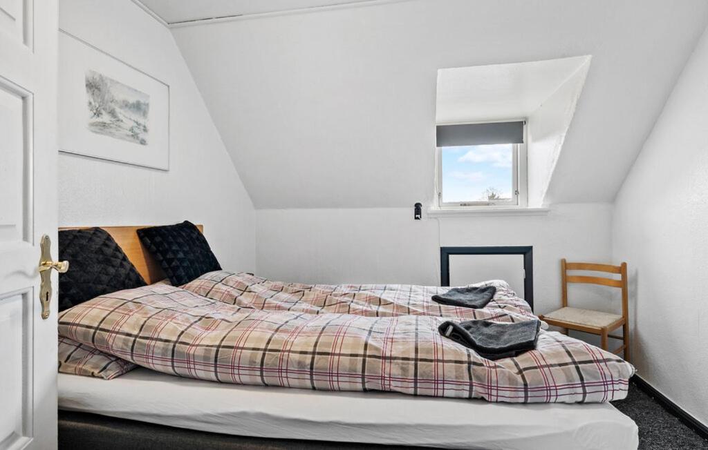 Postel nebo postele na pokoji v ubytování Knudstrup Kro & Hotel