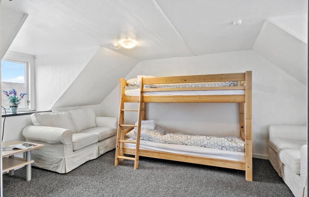 Postel nebo postele na pokoji v ubytování Knudstrup Kro & Hotel