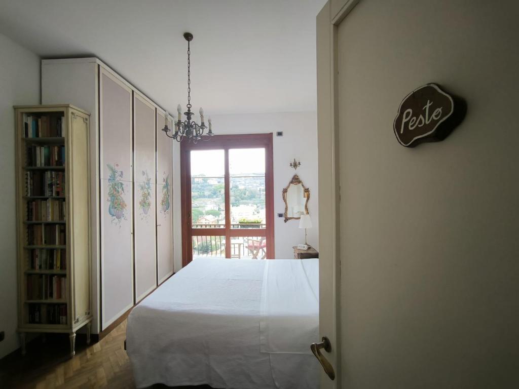 Postel nebo postele na pokoji v ubytování B&B Monte di Portofino