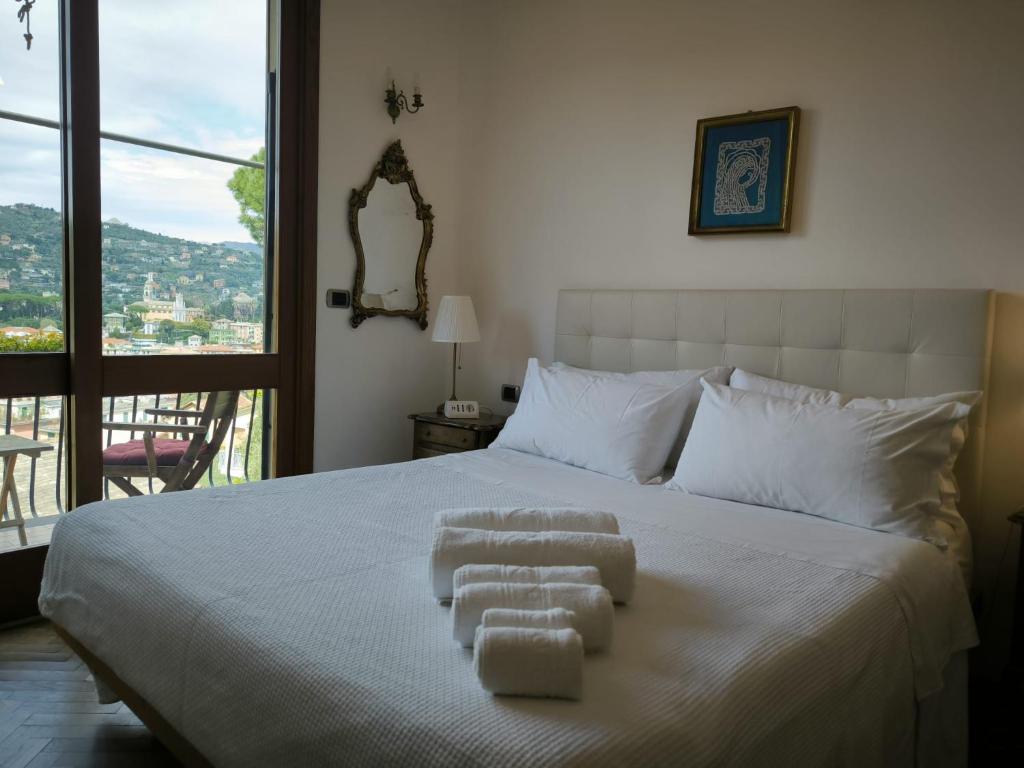 Postel nebo postele na pokoji v ubytování B&B Monte di Portofino