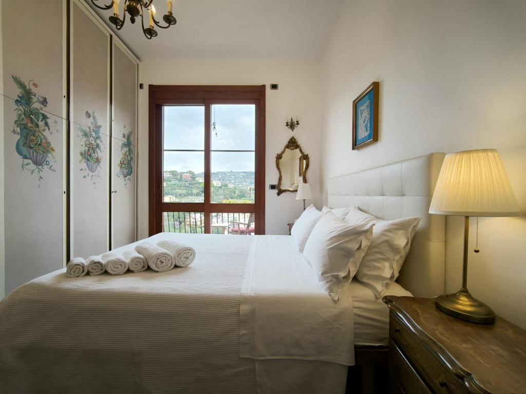 Postel nebo postele na pokoji v ubytování B&B Monte di Portofino