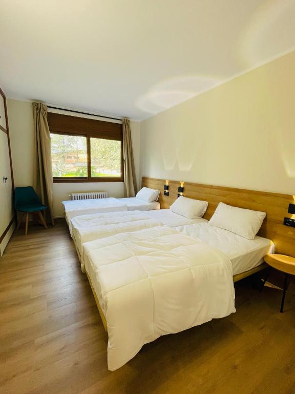 Postel nebo postele na pokoji v ubytování Cubez Viladrau