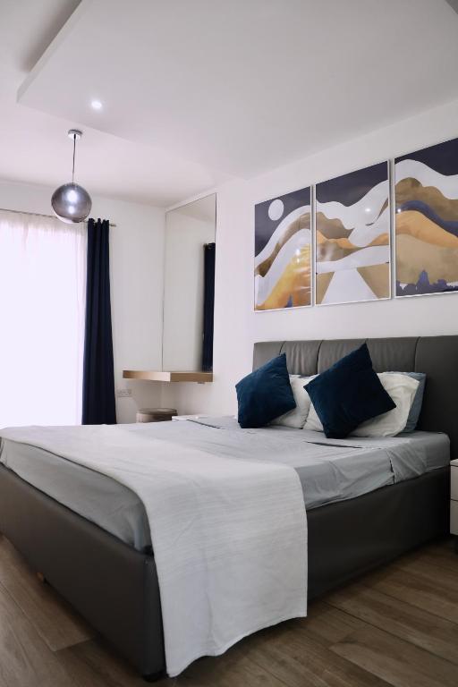 Postel nebo postele na pokoji v ubytování Spinola Apartment