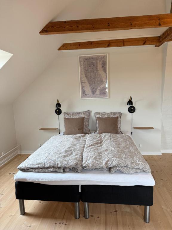 Letto o letti in una camera di Digebjerggaard Bed & Breakfast