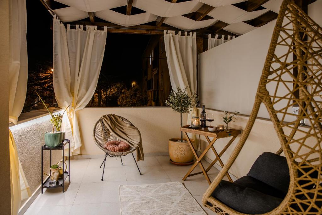 Posezení v ubytování Olea Delux Rooms