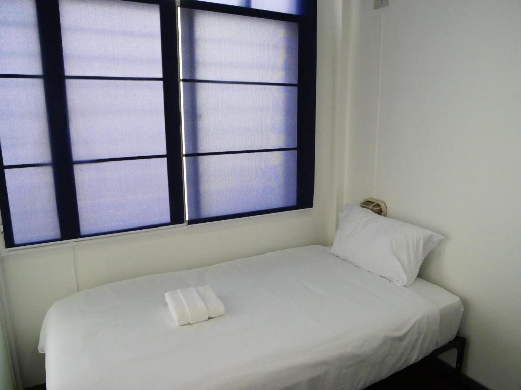 Postel nebo postele na pokoji v ubytování RYB Hostel Phuket