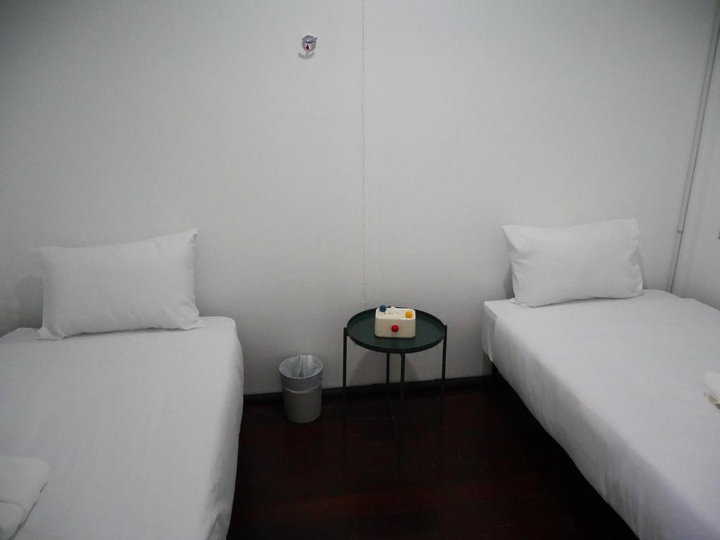 Postel nebo postele na pokoji v ubytování RYB Hostel Phuket