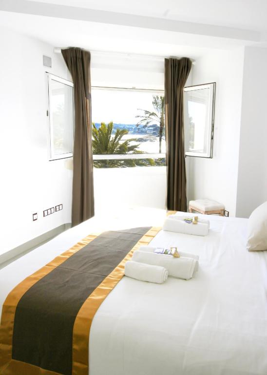 Postel nebo postele na pokoji v ubytování Moraira Beach 1