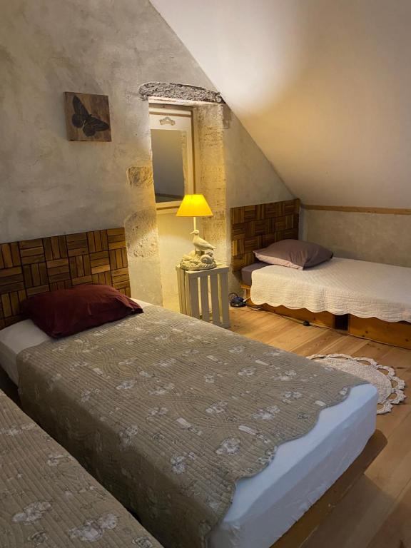 Postel nebo postele na pokoji v ubytování Chambre d’hôtes La Ferté