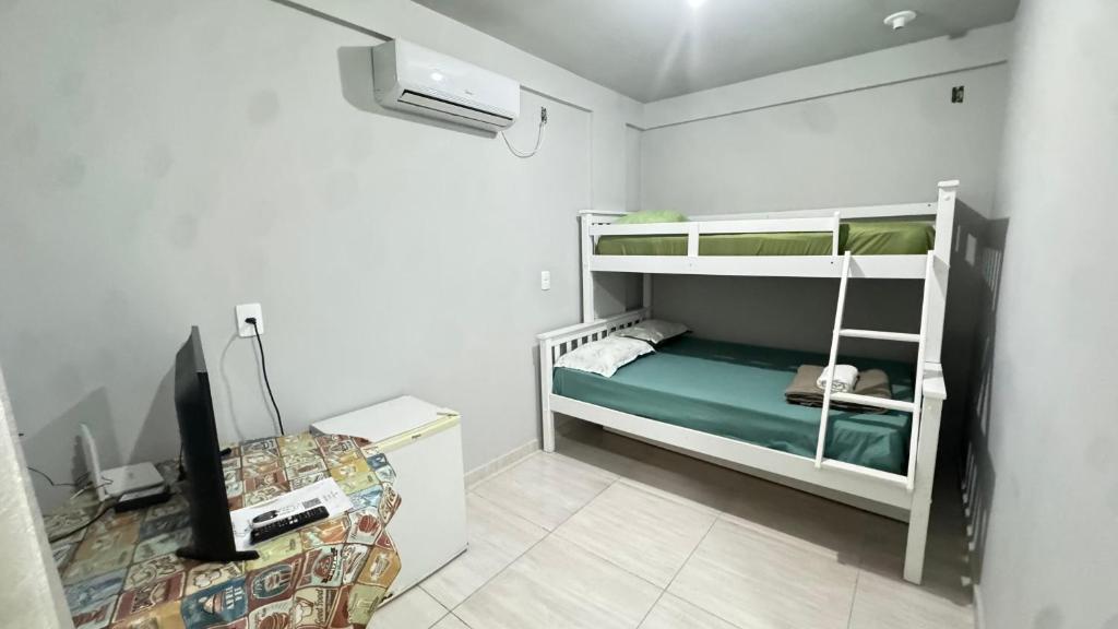 Postel nebo postele na pokoji v ubytování Pousada da Laís
