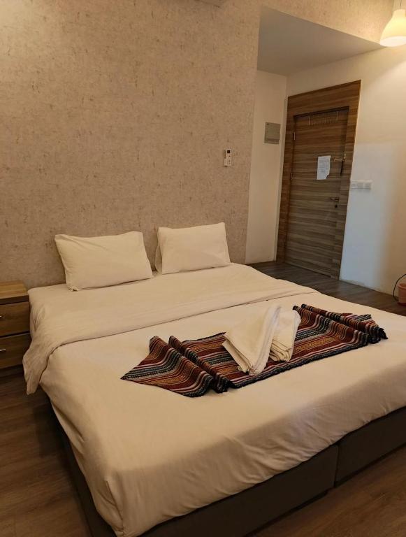 En eller flere senge i et værelse på Gate Inn