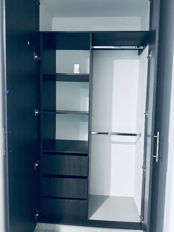 Kuchyň nebo kuchyňský kout v ubytování Hermoso apartamento con Aire Acondicionado Cerca al Hospital de Neiva