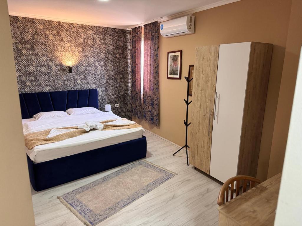Postel nebo postele na pokoji v ubytování Hotel Alisa