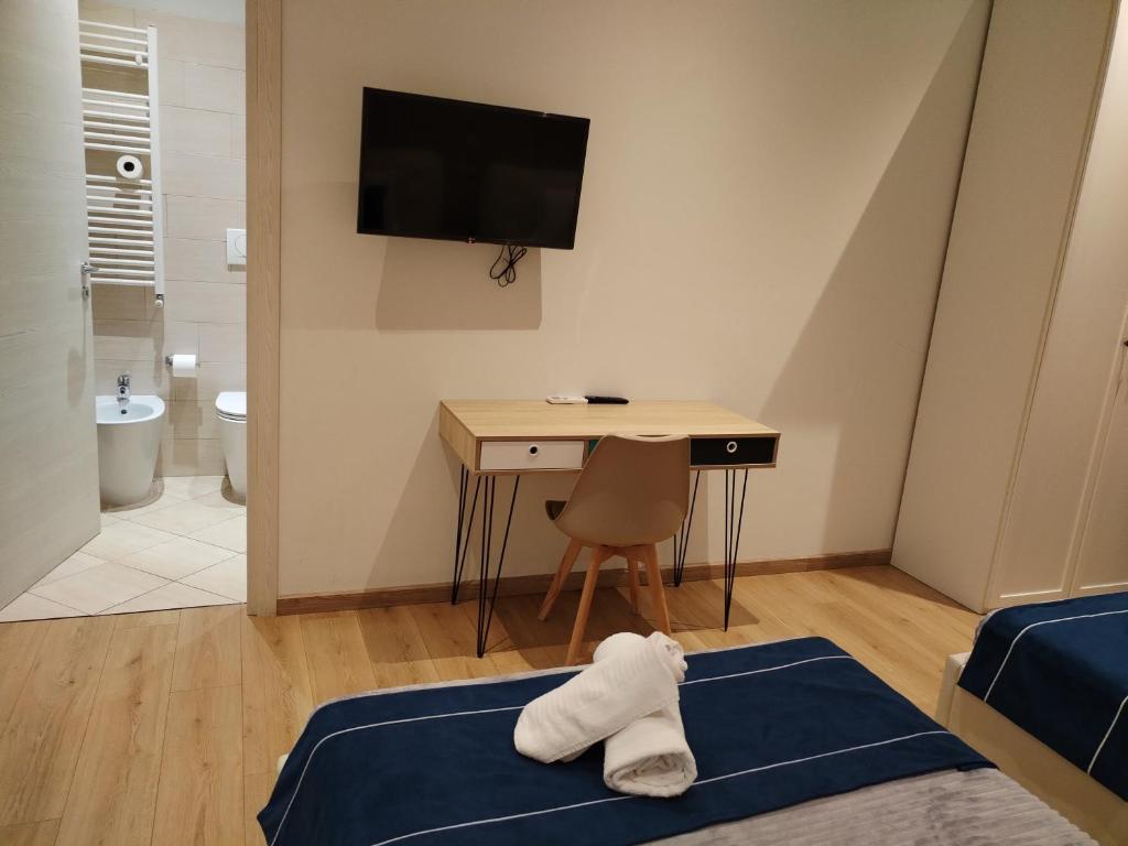 Postel nebo postele na pokoji v ubytování Fiera camera