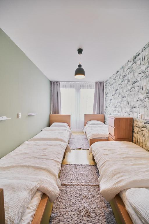 Postel nebo postele na pokoji v ubytování Hostel Prazacka