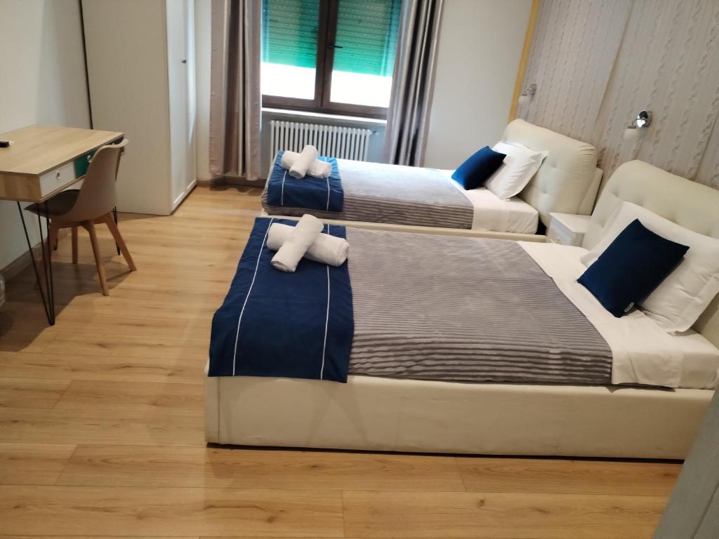 Postel nebo postele na pokoji v ubytování Fiera camera