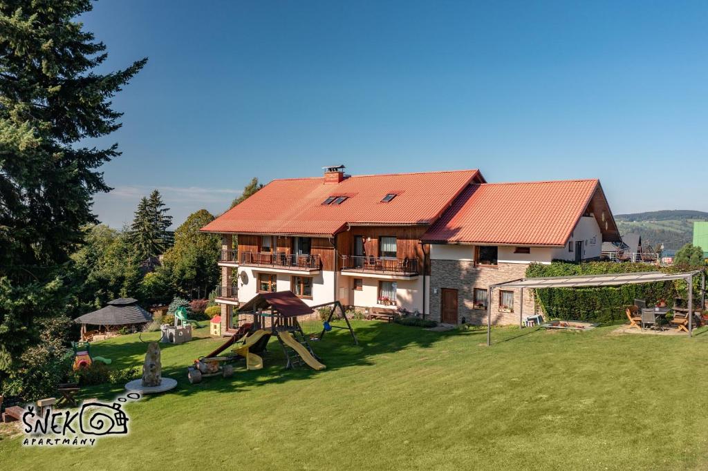 Fotografie z fotogalerie ubytování apartmány Šnek - ať si děti hrají na Benecku