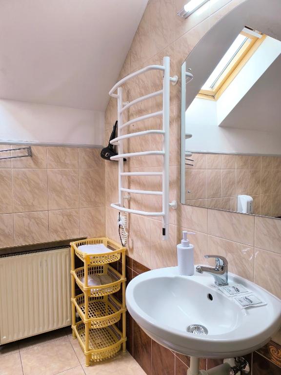 Koupelna v ubytování Hotel Delfin