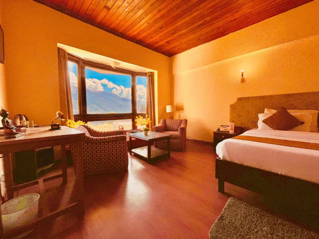 Postel nebo postele na pokoji v ubytování Sagar Heritage Resort, Near Mall Road Manali