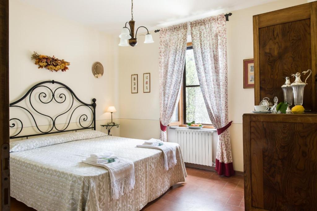 Postel nebo postele na pokoji v ubytování I Pianelli