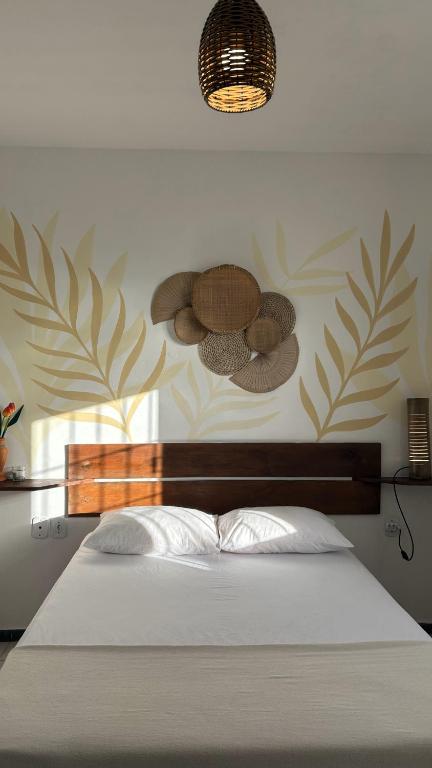 Postel nebo postele na pokoji v ubytování Odoyá Casa Hostel