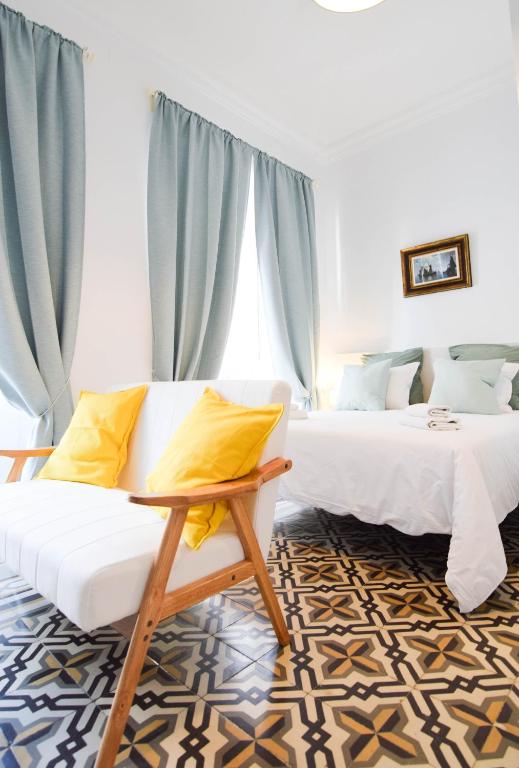 Posteľ alebo postele v izbe v ubytovaní Letmalaga Soho Apartments