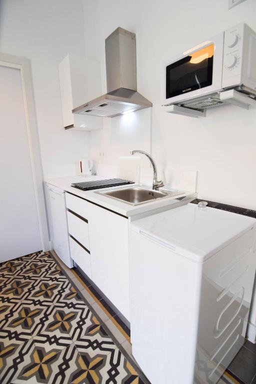 Kuchyňa alebo kuchynka v ubytovaní Letmalaga Soho Apartments