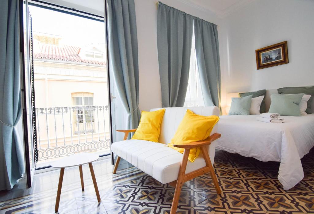 Posteľ alebo postele v izbe v ubytovaní Letmalaga Soho Apartments