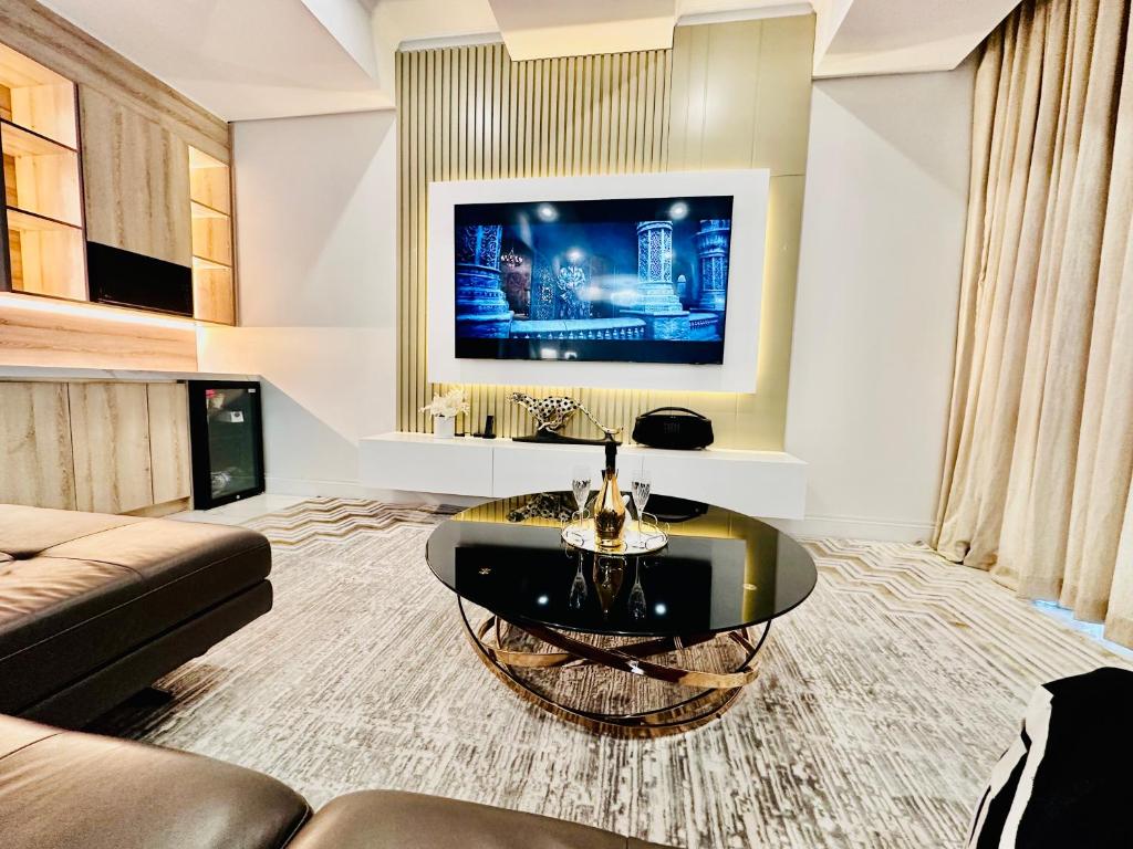Televisyen dan/atau pusat hiburan di H & H Boutique & SPA