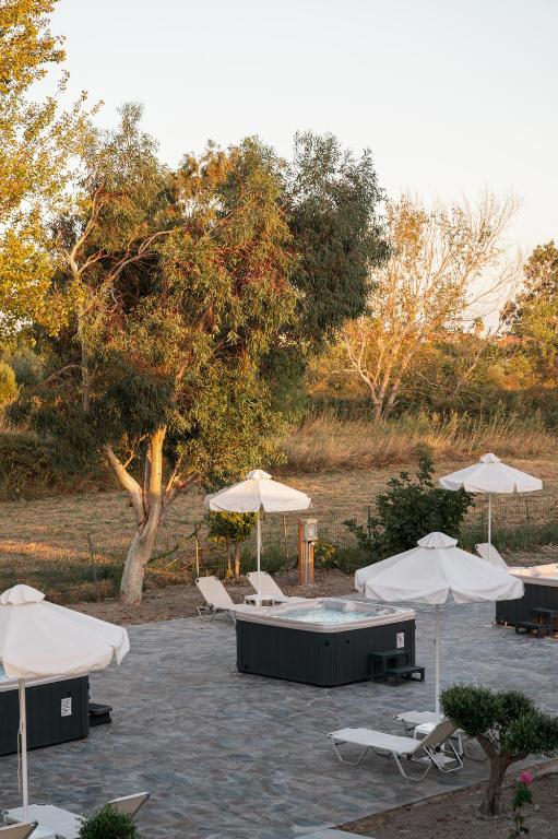 A garden outside Naftilos Rosmarinus Apartments