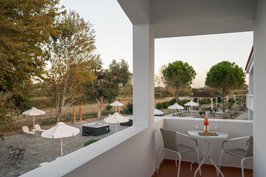 A garden outside Naftilos Rosmarinus Apartments