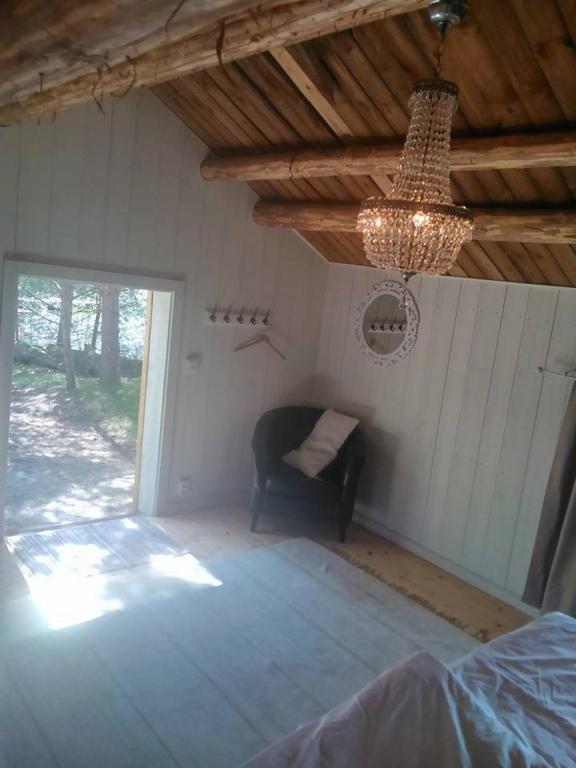 Postel nebo postele na pokoji v ubytování Ösjönäs