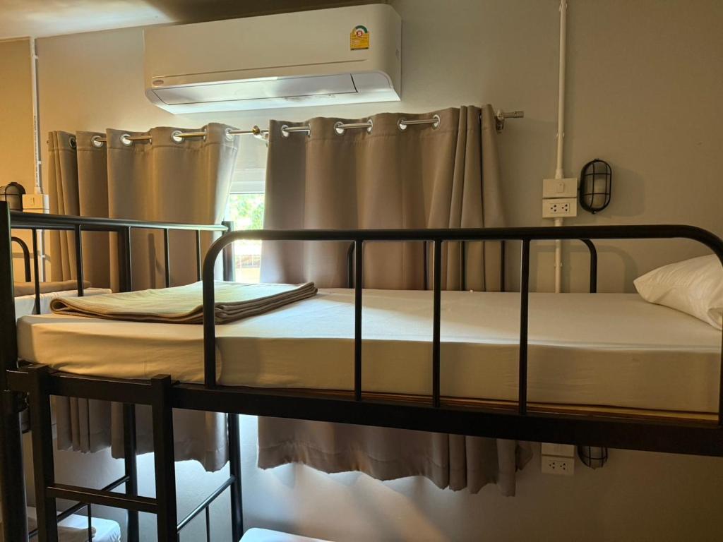 Postel nebo postele na pokoji v ubytování YP Hostel