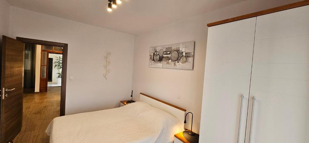 Postel nebo postele na pokoji v ubytování Apartments Huljić