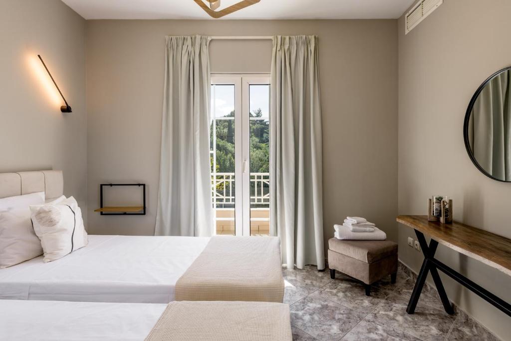 Posteľ alebo postele v izbe v ubytovaní Rodami Artisan Manor