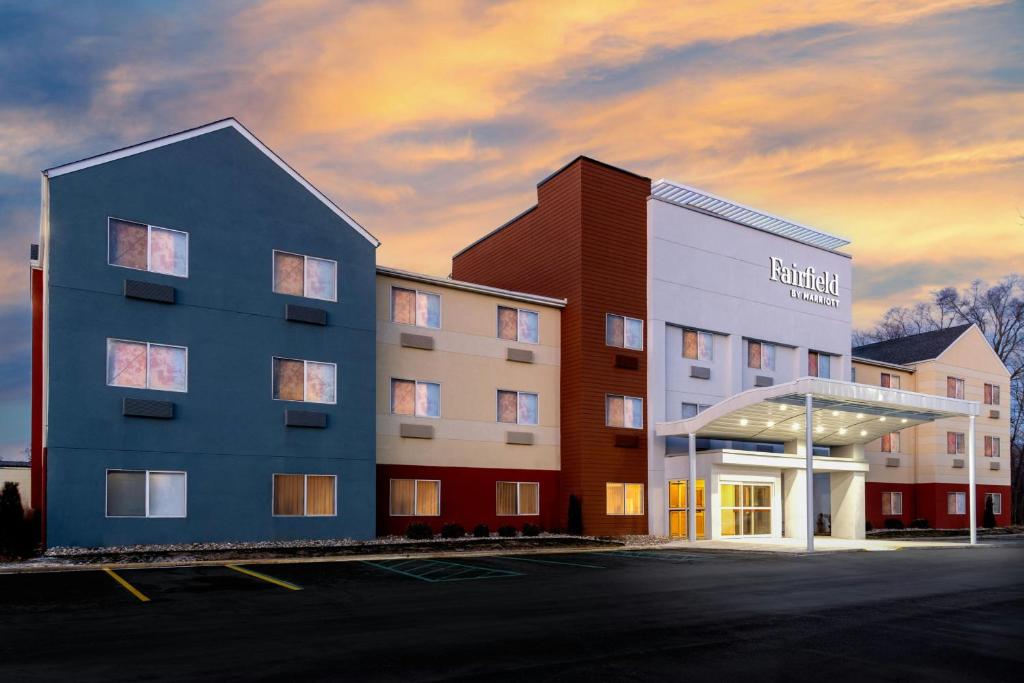 a rendering of a hotel building with a gas station at Fairfield Inn & Suites Jackson in Jackson