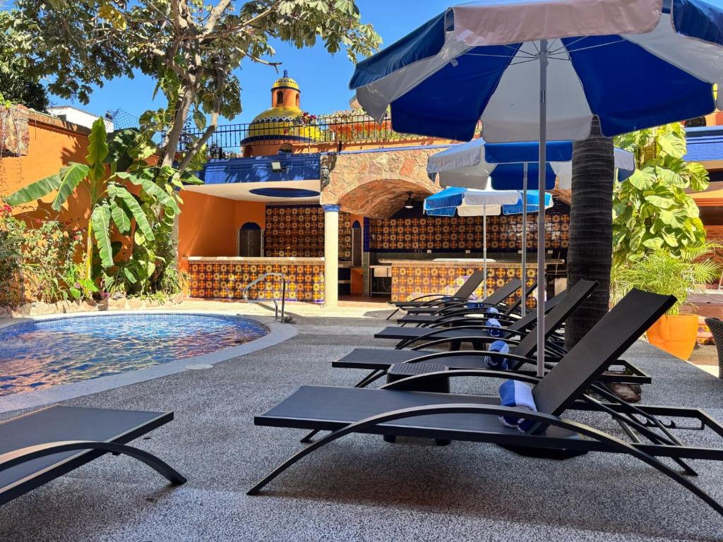 Bazén v ubytování Boutique Hotel & Suites Hacienda Lord Twigg nebo v jeho okolí
