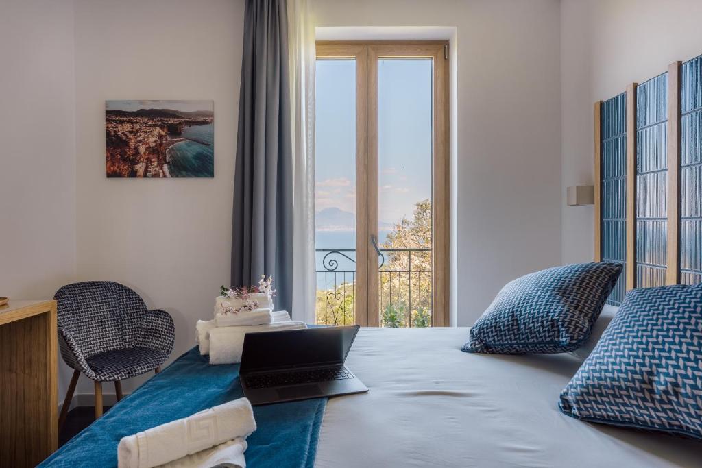 Postel nebo postele na pokoji v ubytování Relais San Francesco