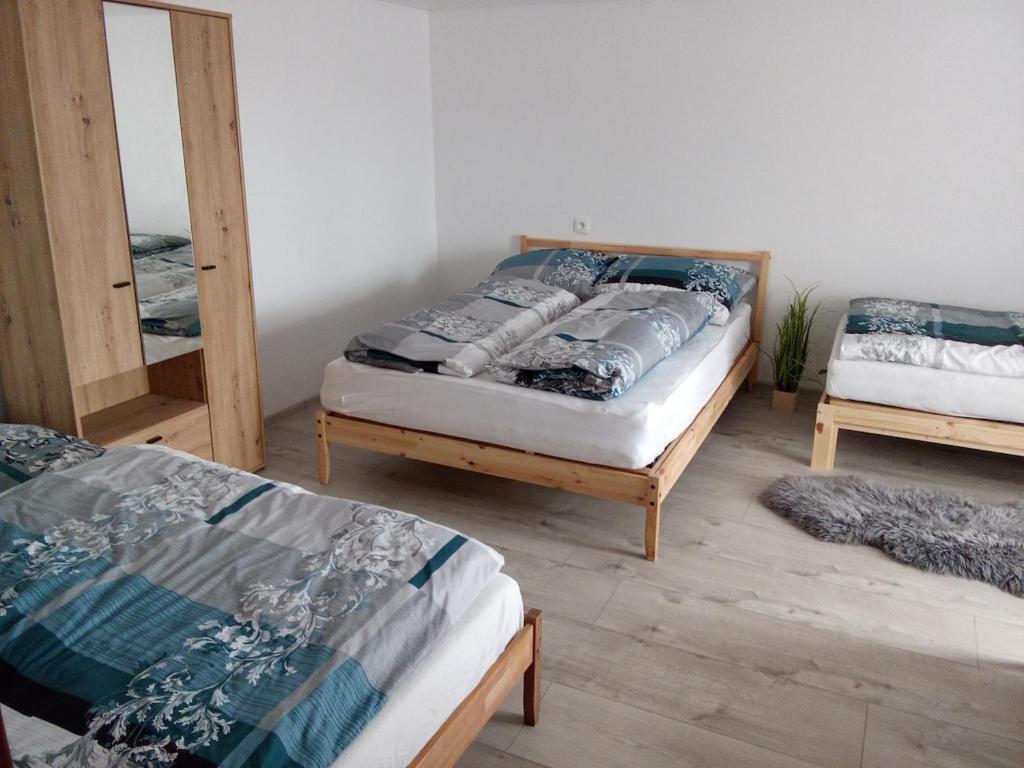 Ένα ή περισσότερα κρεβάτια σε δωμάτιο στο Chata Blazenka