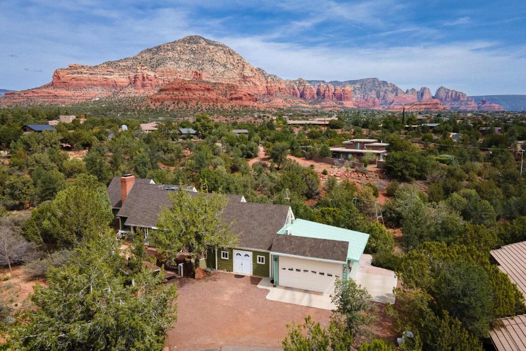 an aerial view of a house with a mountain in the background at Sedona Hilltop Retreat Deck with Red Rock Views in Sedona