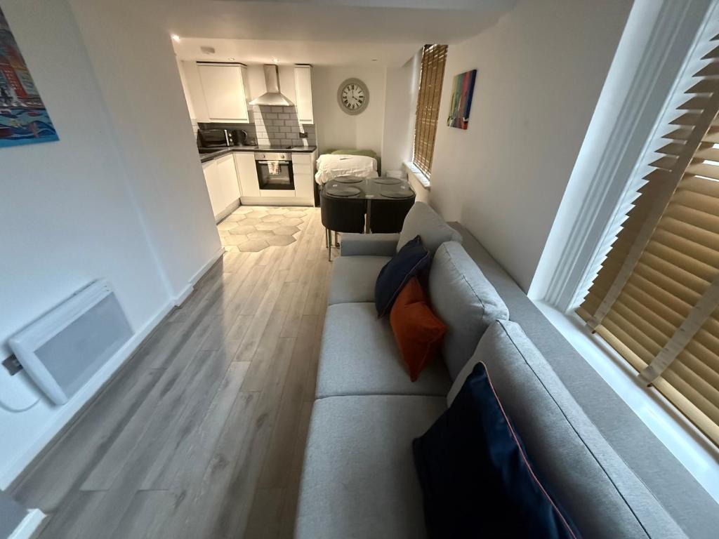 a view of a living room with a couch at 5 Halifax House Apartment 7 in Liverpool