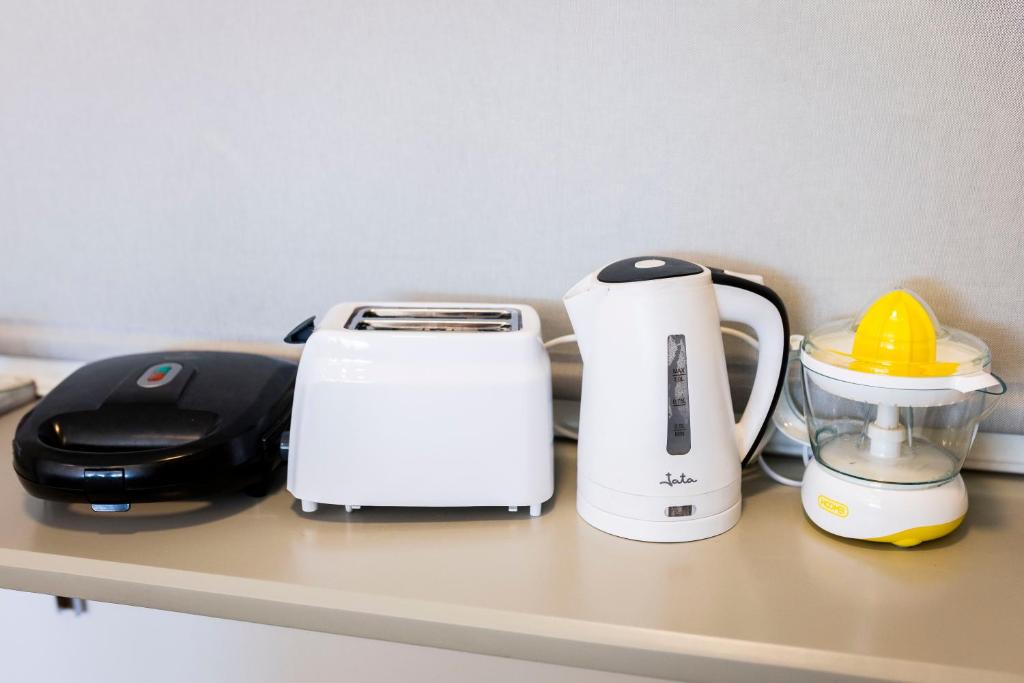 Set per la preparazione di tè e caffè presso Covelodge - Piso a pocos metros de la playa