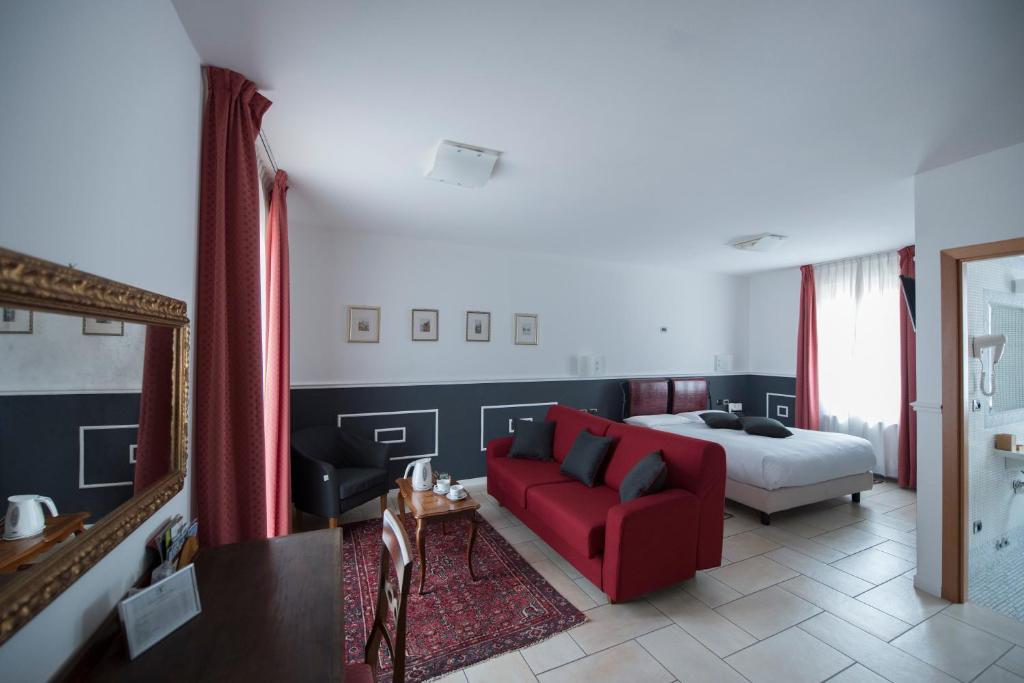 Posteľ alebo postele v izbe v ubytovaní Hotel Villa Colico