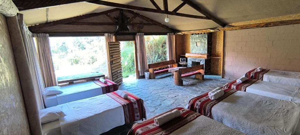 Ένα ή περισσότερα κρεβάτια σε δωμάτιο στο Araplay Lodge