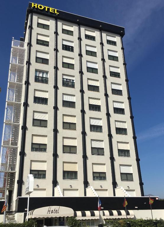 a hotel building with a hotel sign on it at Hotel Albatros in Gandía