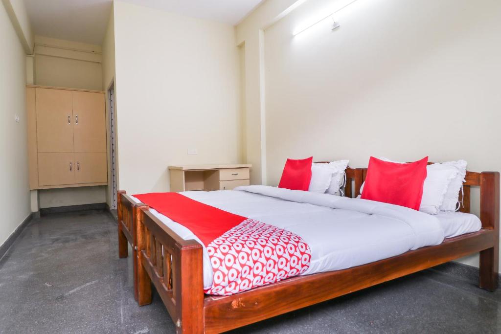 Postel nebo postele na pokoji v ubytování Hotel O Appas Residency